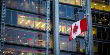 Canadian flag in front of corporate office