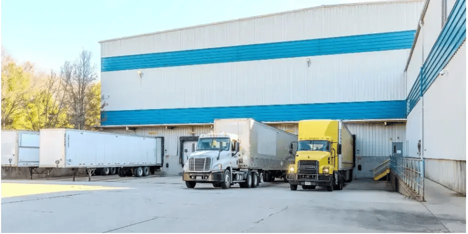  exterior photo of warehouse building truck bay 